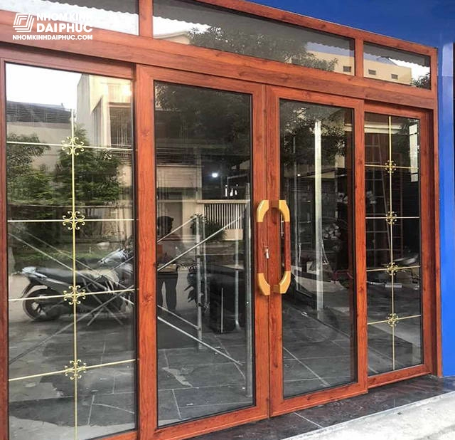 Cửa nhôm trượt quay màu vân gỗ